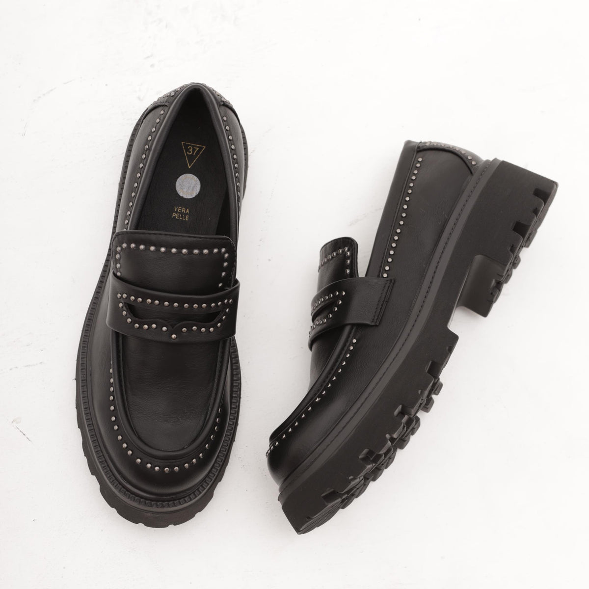MOCASSINO SUOLA ALTA BORCHIE NERO