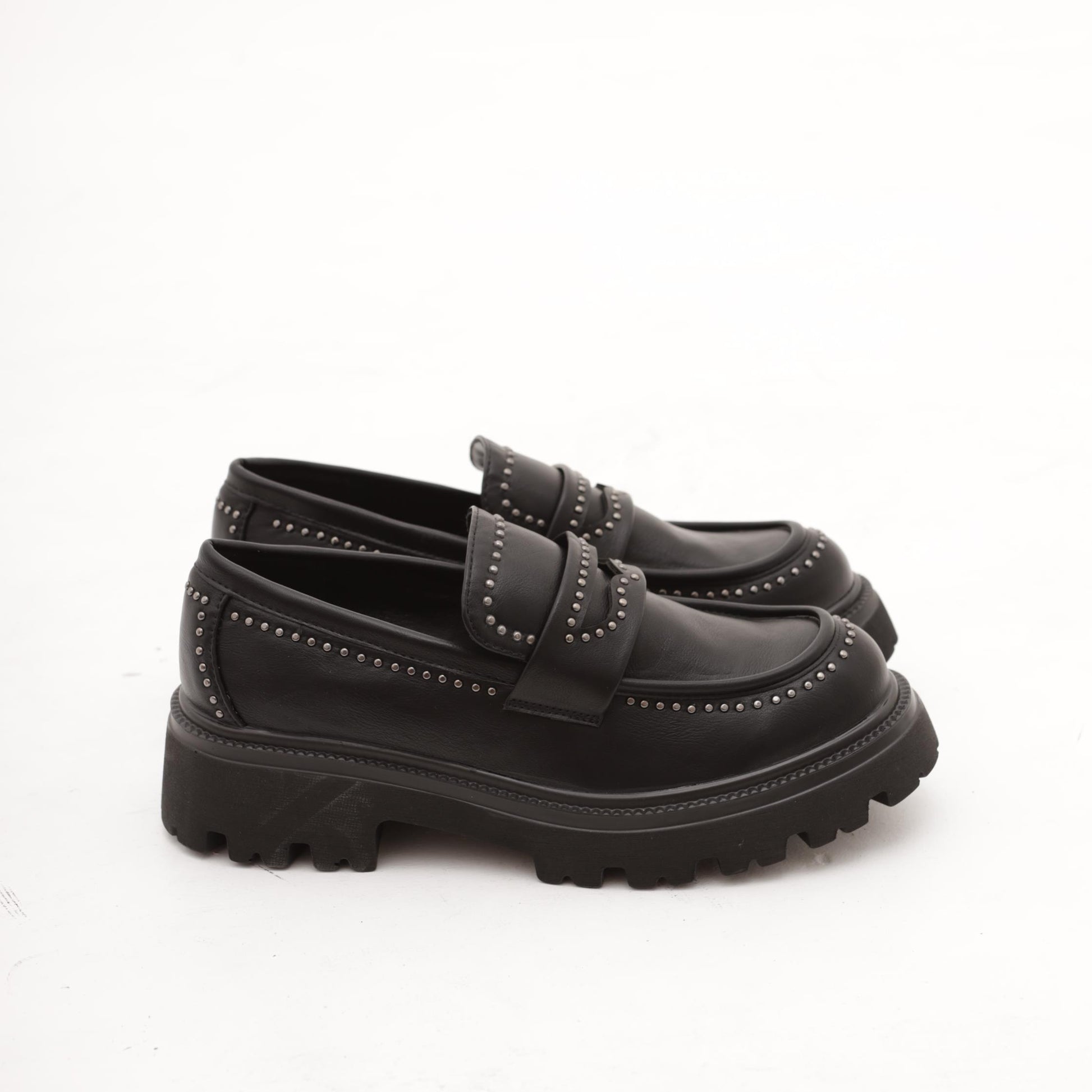 MOCASSINO SUOLA ALTA BORCHIE NERO 