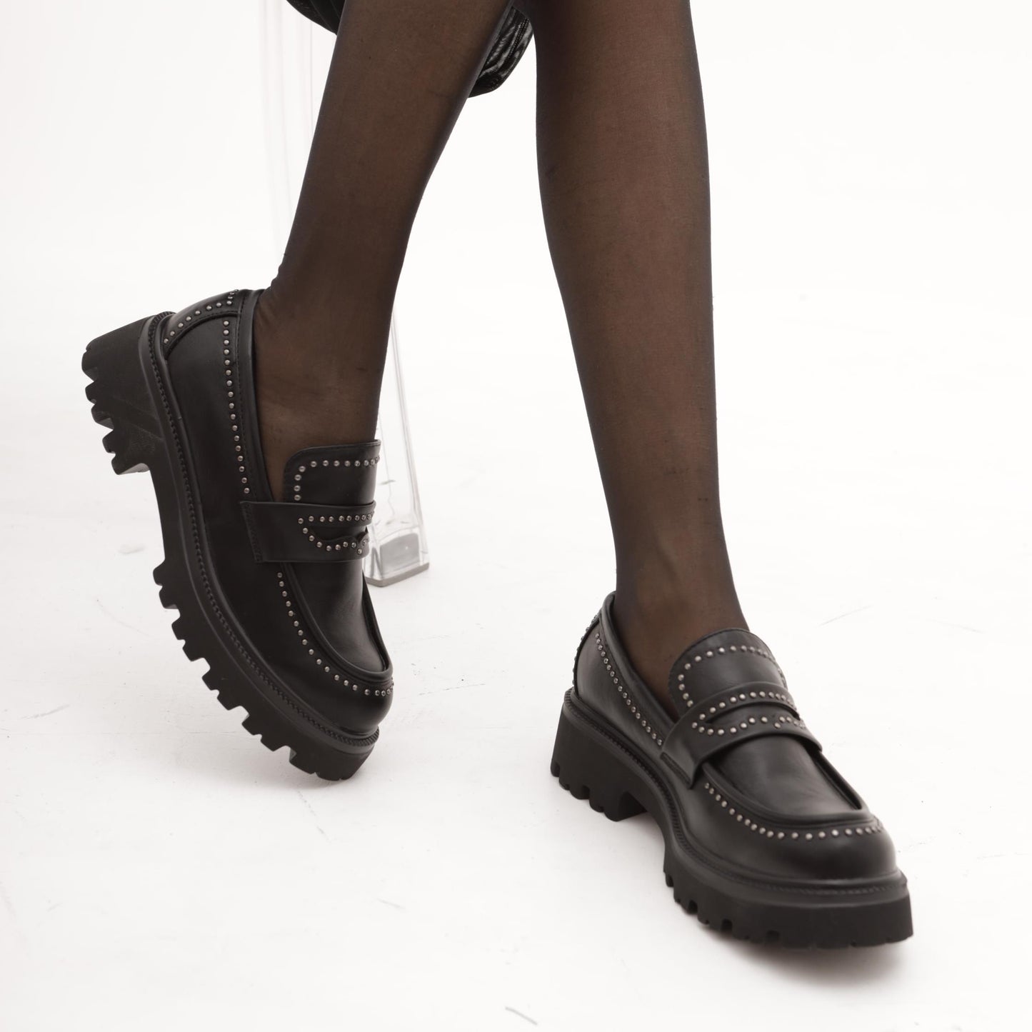 MOCASSINO SUOLA ALTA BORCHIE NERO 